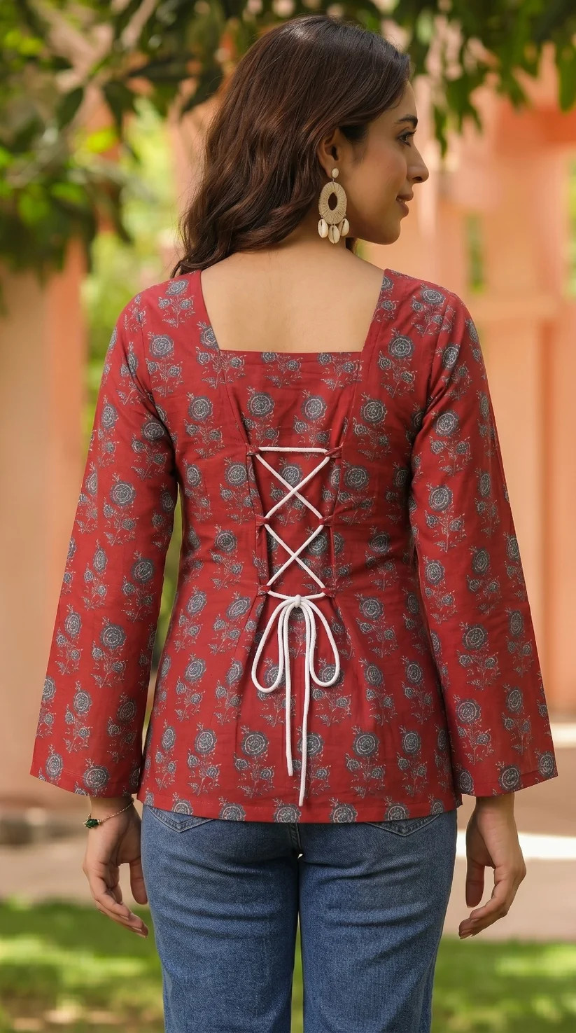women maroon floral printed lace back tunic top