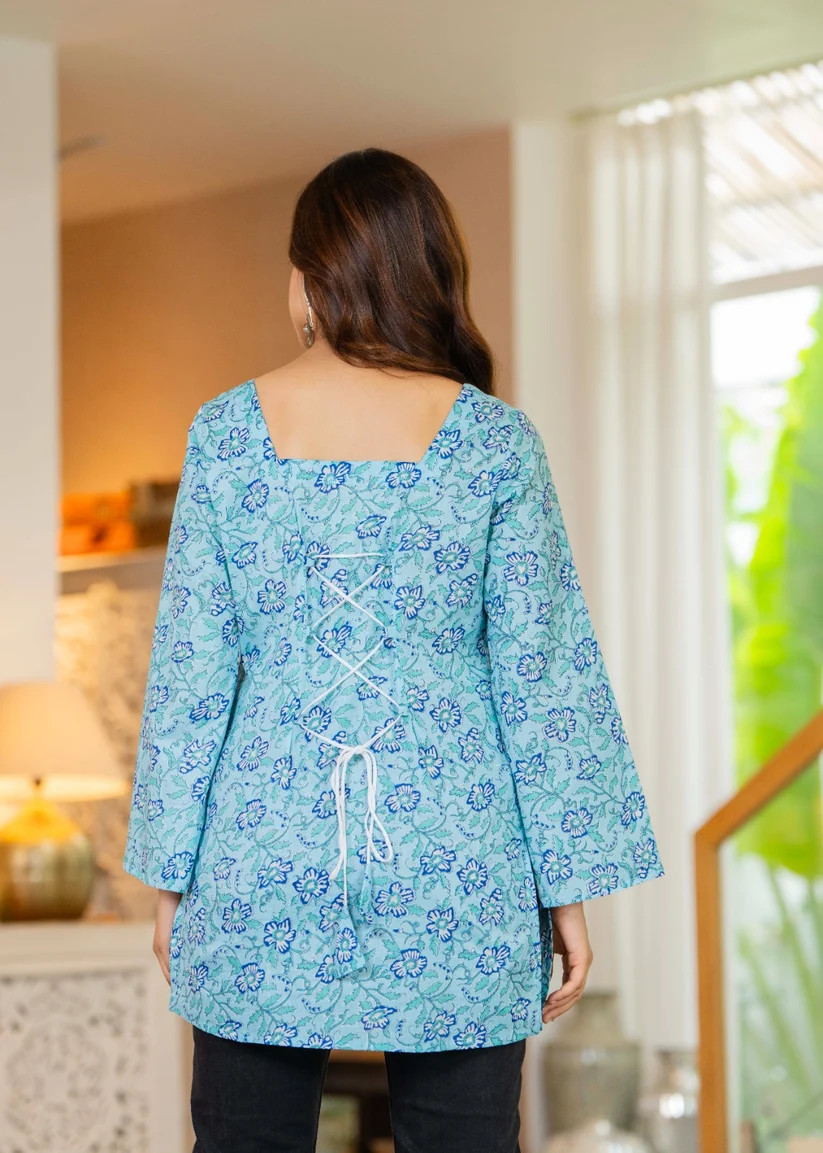women sky blue floral printed lace back tunic top